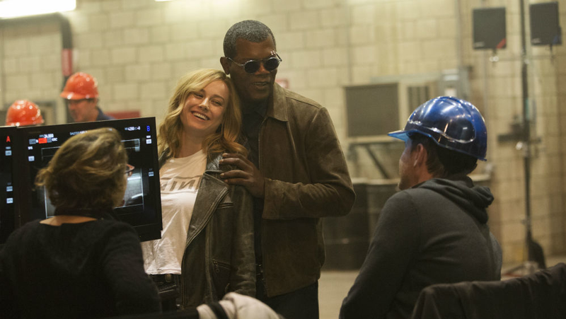 Larson with Samuel L. Jackson and her directors.